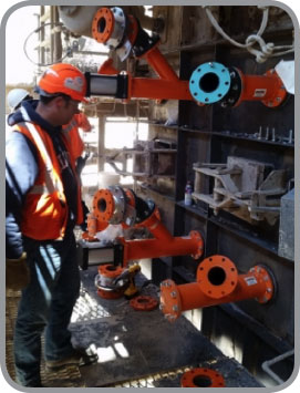 Martin Service Technician installing muliple Martin Air Cannons with new Jet Nozzle.